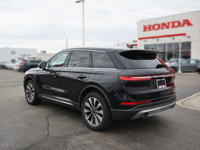 Experience the refined luxury of this 2021 Lincoln Corsair Reserve, boasting a sleek Infinite Black... (image 6)