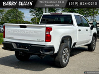 The 2025 Chevrolet Silverado 2500HD Custom in pristine white with a robust 44 drivetrain is designed... (image 3)