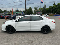 Come by and check out this dependable and budget-friendly 2015 Toyota Corolla CE! Powered by a fuel-... (image 2)