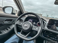 The 2023 Nissan Rogue includes leather seats, heated front and rear seats, a panoramic sunroof, and... (image 9)