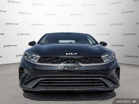 This 2023 Kia Forte LX boasts a sleek black exterior and a surprisingly spacious interior perfect fo... (image 9)