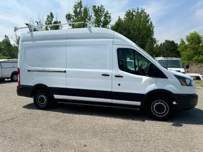 2015 Ford Transit Cargo Van High Roof with 3.7L V6 engine, 148", shelves inside, auto ac, back up ca...