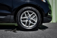 This 2022 Ford Edge is for sale today. This SUV has 92,656 kms. It's black in colour . It has a 8 sp... (image 6)