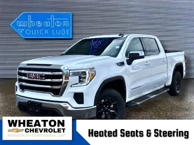 The 2021 GMC Sierra 1500 SLE in Summit White is a versatile and capable pickup with a comfortable Je...