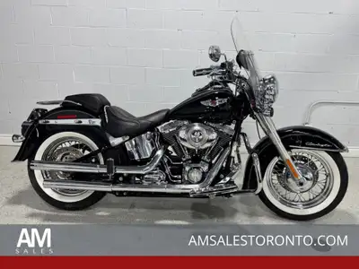 Beautiful DELUXE with Vance & Hines pipes, white wall tires, Willy G floor boards and brake pedal, W...