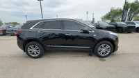 This Cadillac XT5 is equipped with: Leather Seating Surfaces w/Mini Perforated Inserts, Power moonro... (image 3)