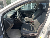 The 2015 Chevrolet Cruze 1LT offers a balanced driving experience that prioritizes comfort and effic... (image 6)