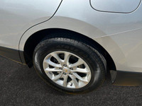 Offering excellent driving manners, this Chevrolet Equinox is SILVER in color and is equipped with a... (image 8)