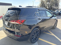 The 2022 Chevrolet Equinox RS brings a bold and athletic look with its Mosaic Black Metallic paint,... (image 7)