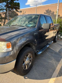 Check out this 2006 Ford F-150 XLT! With its powerful 8 Cylinder engine, 4WD capability, and spaciou... (image 1)