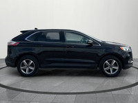Up for sale is a well-maintained 2019 Ford Edge SEL, featuring a sleek black exterior and a rare tan... (image 6)