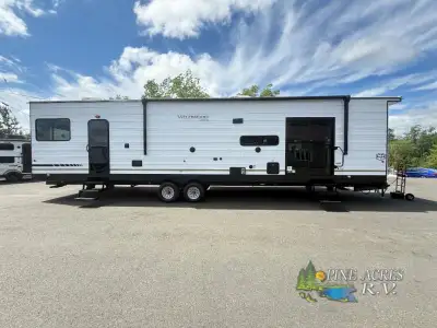 Forest River Wildwood Lodge destination trailer 40FDEN highlights: Two Slides King Bed with Versa-Ti...