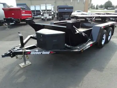Come check out this EZ lift trailer. This trailer has tandem 7000 lb axles with electric brakes and...