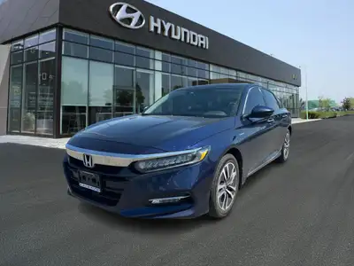 The 2018 Honda Accord Hybrid Touring is a midsize sedan that seamlessly blends efficiency, performan...