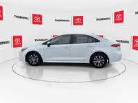This, is a White 2024 Toyota Corolla Hybrid with LE AWD Package, Featuring:~ Complete Service Histor... (image 5)
