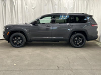 The 2025 Jeep Grand Cherokee L Limited 4x4 in sophisticated gray with its smooth 4x4 drivetrain prom... (image 2)