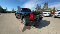 This 2025 RAM 1500 BIGHORN/LONESTAR CREW 4X4 has the following options Deluxe Cloth Bucket Seat, Rem... (image 1)