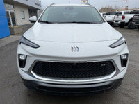 The 2025 Buick Encore GX Sport Touring in Summit White is a stylish and sporty subcompact SUV. Its s... (image 1)
