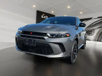 The 2024 Dodge Hornet R/T Plus is a compact utility vehicle (CUV) that combines performance and effi...