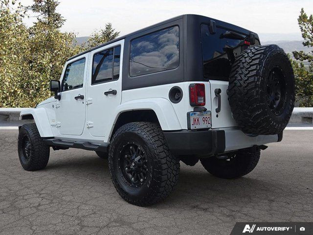 2014 Jeep Wrangler Unlimited Sahara in Cars & Trucks in Moncton - Image 4