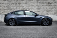 This 2023 Tesla Model 3 is for sale today. This sedan has 42,389 kms. It's grey in colour . It has a... (image 1)