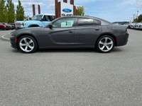 This 2018 Dodge Charger SXT has a Grey Exterior and Cream Interior with seating for 5. Equipped with... (image 2)