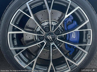 Experience the exhilarating performance of the 2025 Volkswagen Golf R in a pristine white finish. Th... (image 7)