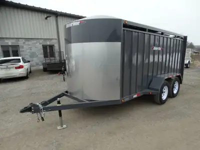 Come take a look at this 15in. livestock trailer! This trailer has tandem 3500 lb torsion axles with...