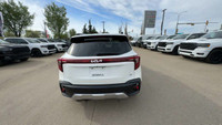 This Kia Seltos is equipped with: Cloth Seats, Heated front seats, Heated steering wheel, Air Condit... (image 9)