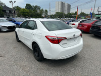 Come by and check out this dependable and budget-friendly 2015 Toyota Corolla CE! Powered by a fuel-... (image 3)