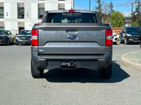 This 2022 Ford Maverick XL has an Carbonized Grey Exterior and Black Onyx Med Interior with seating... (image 5)