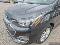 This 2021 Chevrolet Spark 1LT Hatchback offers surprising practicality in a compact package. Its pep... (image 9)