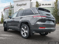 This Jeep Grand Cherokee 4xe has a dependable ECX 2.0L DOHC I-4 DI Turbo PHEV engine engine powering... (image 3)