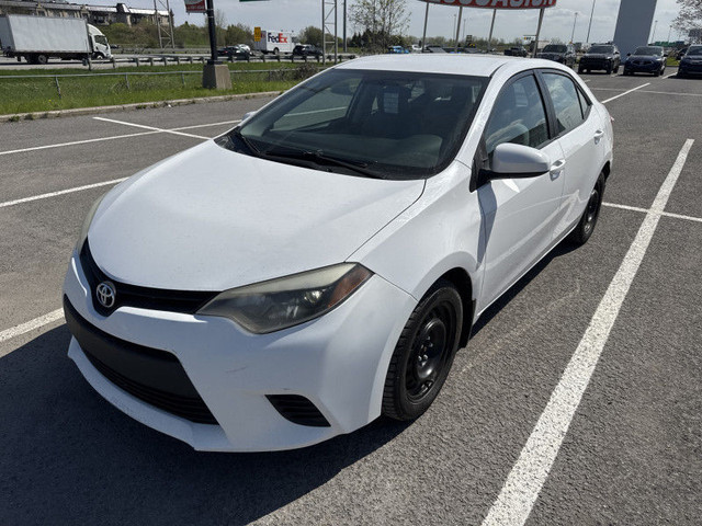 2014 TOYOTA COROLLA LE ECRAN BLUETOOTH SIEGES CHAUF A/C TISSUS in Cars & Trucks in Laval / North Shore