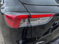 This Ford Escape boasts a Intercooled Turbo Premium Unleaded I-3 1.5 L/91 engine powering this Autom... (image 9)
