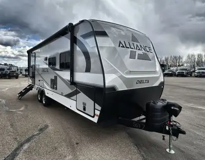 Perfect for couples or small families!Full Rear Bathroom: Complete with shower, toilet, vanity, and...