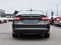 The 2015 Ford Fusion is a sleek, midsize sedan that offers a perfect blend of style, efficiency, and... (image 6)