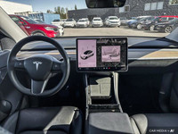 This Tesla Model Y delivers a Electric engine powering this Automatic transmission. Window Grid Ante... (image 9)