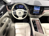 The 2022 Volvo XC60 Momentum blends luxury and performance seamlessly, offering a refined driving ex... (image 6)