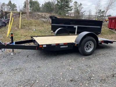 Canada Trailers Tilt and Load 612-5K trailer is 6'x12' and may include: 15" Radial Tire, Slipper Sus...