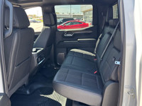 The Chevrolet Silverado 1500 High Country in pristine white with a robust 4×4 drivetrain ensures exc... (image 9)