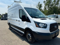 2015 Ford Transit Cargo Van High Roof with 3.7L V6 engine, 148", shelves inside, auto ac, back up ca... (image 1)