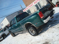 NORTH POINT MOTORS...CALL TEXT 780-224-7791 CHECK OUT THIS 03 DODGE RAM 3500 QUAD CAB 4X4 DRW 5.9L C... (image 1)