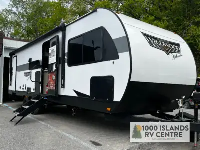 Ex-Rental Forest River Wildwood travel trailer 26DBUD highlights: Dual Entry Double-Size Bunks Versa...