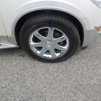 This 2010 Buick Enclave is a stylish and reliable SUV with plenty of room for your family and advent... (image 9)