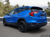 This stunning 2024 GMC Terrain SLE, boasting a sleek Downpour Metallic exterior and a sophisticated... (image 3)