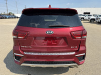 This 2019 Kia Sorento is finished in striking Passion Red Metallic with a refined Black interior, of... (image 6)