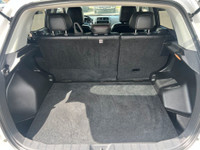 This 2020 Mitsubishi RVR SEL has a White Exterior and Black Interior with seating for 5. Equipped wi... (image 6)