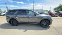 This Dodge Durango is equipped with: Cloth Bucket Seats, Power Sunroof, Front Heated Seats, Heated S... (image 3)