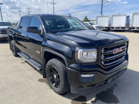 Poised for performance and utility, the 2018 GMC Sierra 1500 SLT stands proudly with a sleek Onyx Bl... (image 9)
